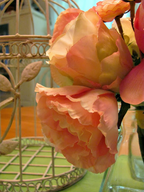 white birdcage with roses