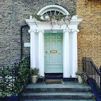 Photos of Dublin: Light green door with ivy