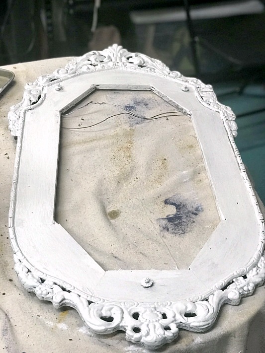 priming an antique frame
