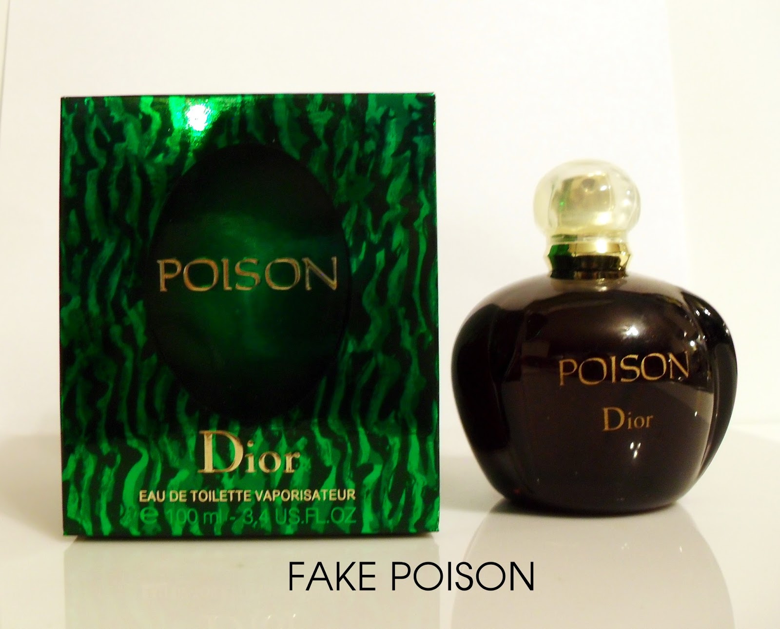 poison perfume green bottle