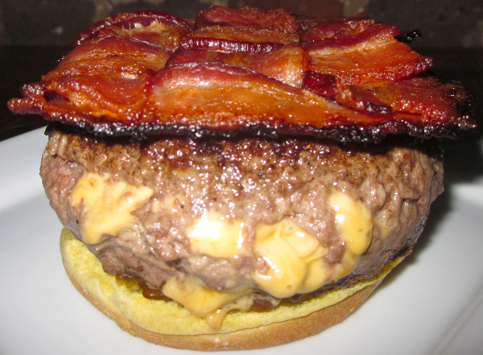 Haute + Heirloom Mac n' Cheese Stuffed Burgers with CocaCola Caramelized Onions & Weaved Bacon