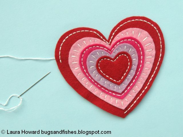 decorating the felt heart