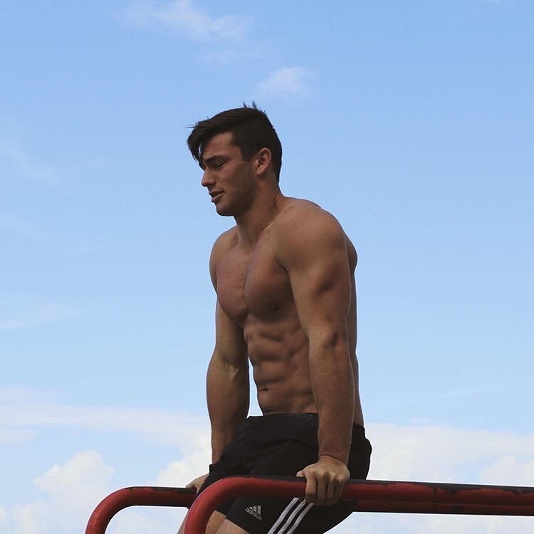 fit-shirtless-young-guy-outdoor-gym-working-out