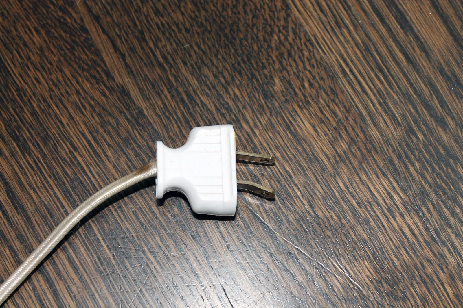 Recoiling Power Socket With Stowaway Extension Cord