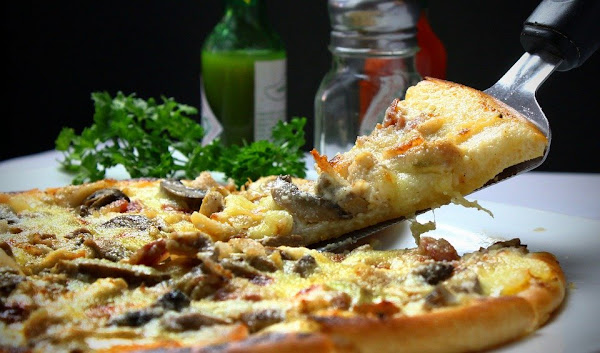 Image: Delicious pizza slice, by Joshuemd on Pixabay