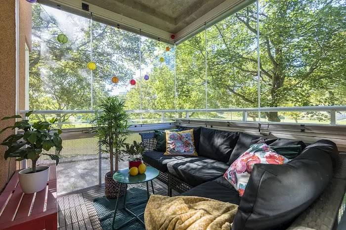 Terraza cerrada con vidrio