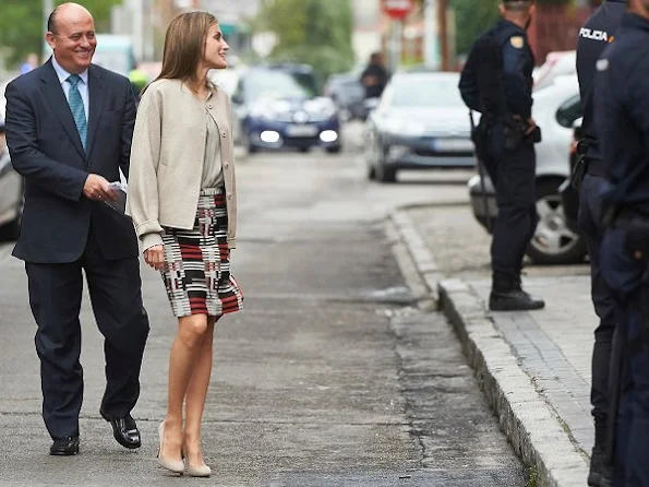 Queen Letizia style, wore Hugo Boss coat, Uterque skirt, Magrit pumps, diamond Earrings, Cartier art deco diamond bracelet