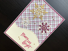 Merry and Bright Christmas card with die cut snowflakes on a tartan background