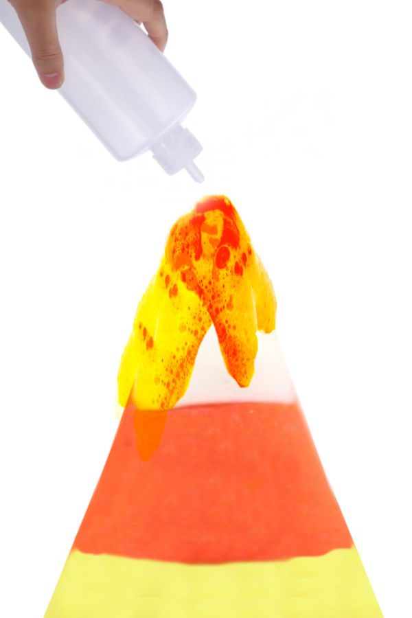 Can you make a candy corn volcano erupt? This Halloween science experiment challenges kids to try! #candycorn #candycorncrafts #candycornrecipe #candycornvolcano #candycornexperimentforkids #candycornexperiment #candycornactivities #candycorncraftspreschool #candycornscienceexperiment #growingajeweledrose #activitiesforkids #fallactivities Can you make a candy corn volcano erupt? This Halloween science experiment challenges kids to try! #candycorn #candycorncrafts #candycornrecipe #candycornvolcano #candycornexperimentforkids #candycornexperiment #candycornactivities #candycorncraftspreschool #candycornscienceexperiment #growingajeweledrose #activitiesforkids #fallactivities