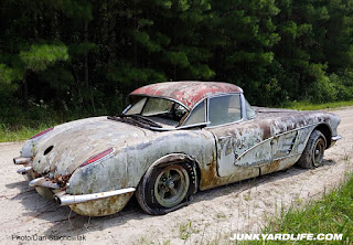 Side view of rescued 1959 field find Corvette.