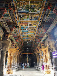 Old paintings and stone carvings on pillars, may be as old as the temple