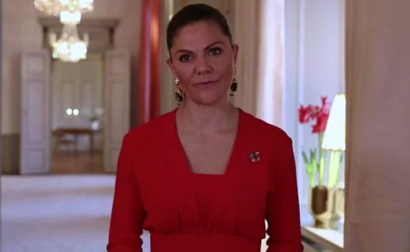 Crown Princess Victoria wore multifunctional earrings from H&M Conscious Collection, and a red dress from H&M Conscious Collection