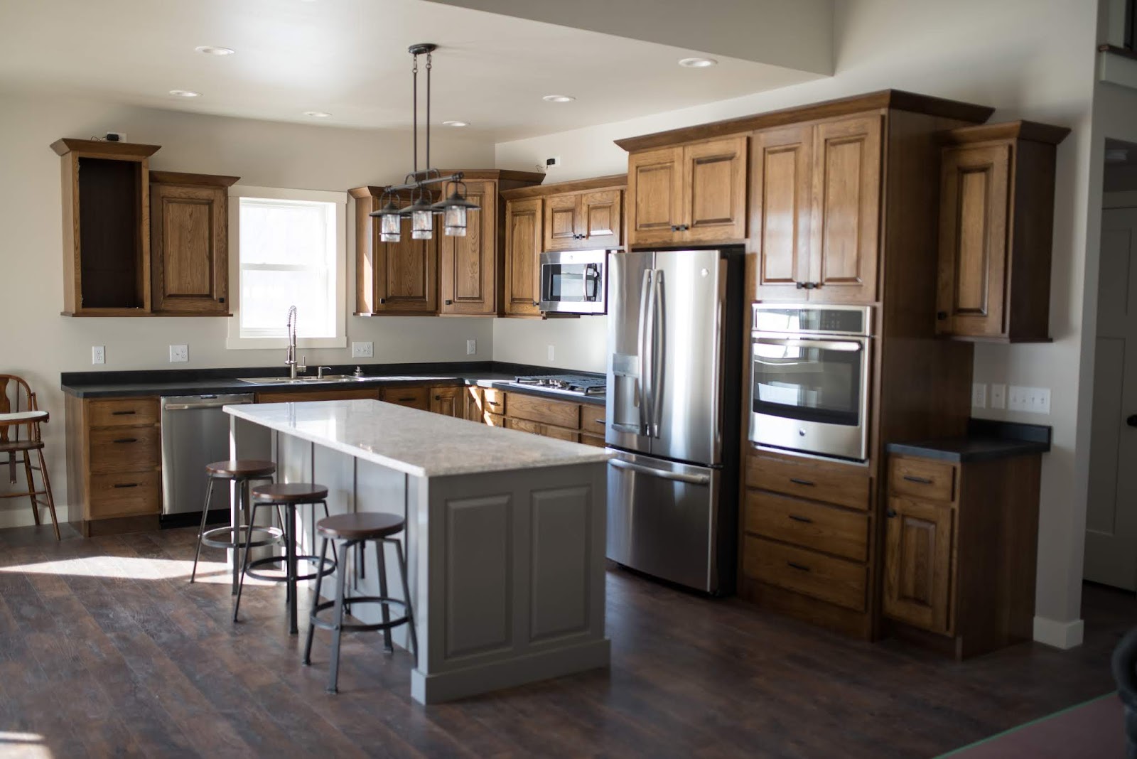 The Shopp Hickory gray island and custom stairway