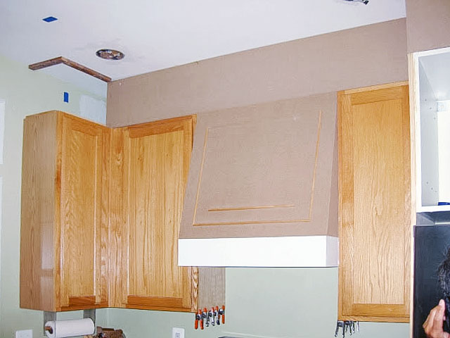 MDF and moldings are used to cover space above cabinets