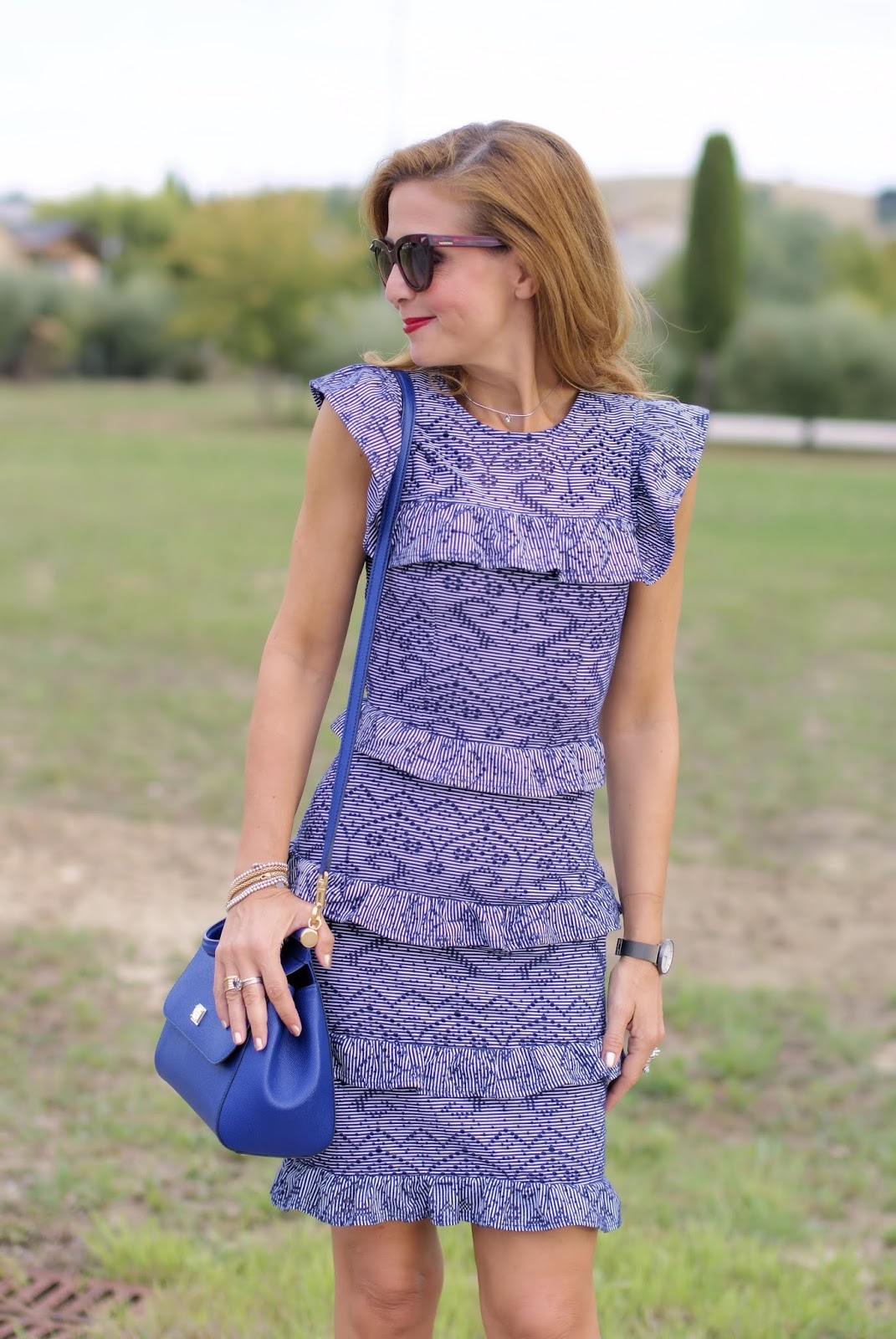 How to wear a denim jacket on an elegant dress on Fashion and Cookies fashion blog, fashion blogger style