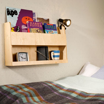 wall-mounted storage shelves intended for use in top of bunk bed; holds books and other items