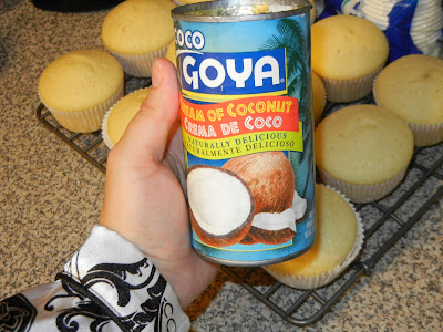 goya cream of coconut can with cupcakes on a cooling rack in the background 