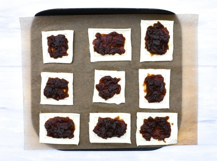 Making falafel onion pies - step 3 Making falafel onion pies - step 3 - onion added to the pastry squares