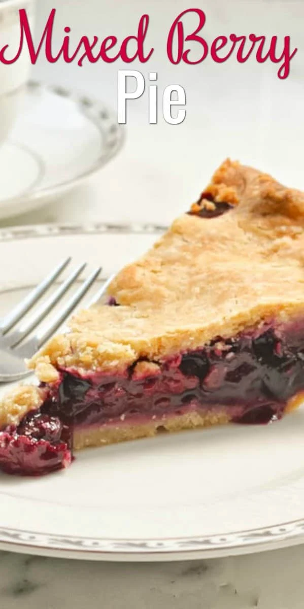 Mixed Berry Pie Recipe using frozen or fresh berries in a flaky sour cream pie crust. A favorite Thanksgiving Pie recipe from Serena Bakes Simply From Scratch.