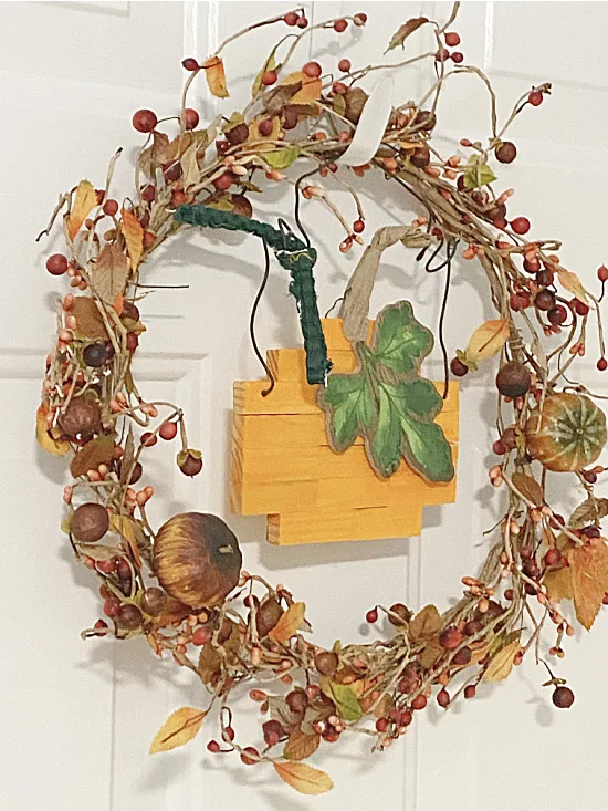 wreath with dollar tree block pumpkin