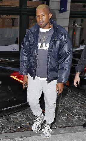 Troubled rapper, Kanye West and his blond hair step out in New York city