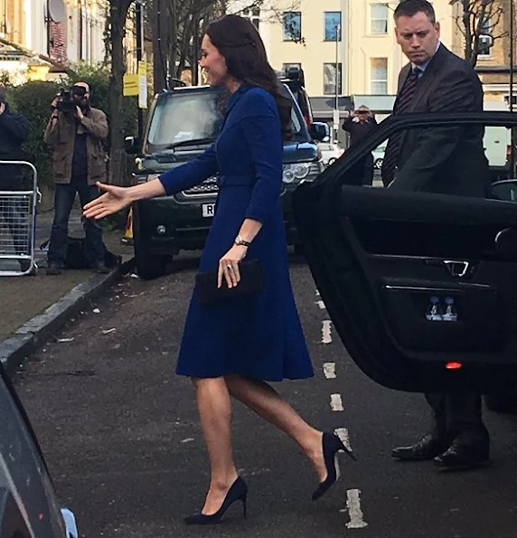 Kate Middleton wore Eponine London Belted Blue Coat, Gianvito Rossi Suade pumps, Russell and Bromley Clutch