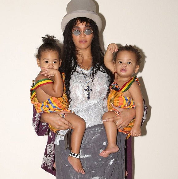 Beyoncé poses with twins Sir & Rumi Carter during Halloween... Toya'z World