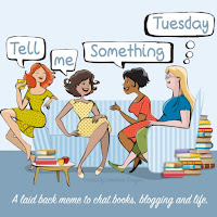 Cartoon style header with 4 women of varying ethnicities sitting in a group discussing books with the text Tell Me Something Tuesday in thought bubbles about their head