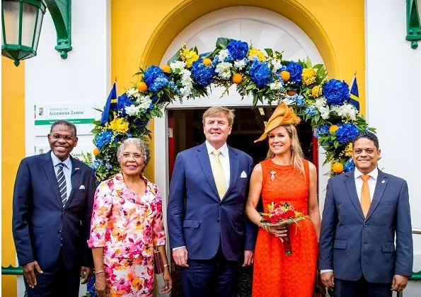 Queen Maxima- wore NATAN Dress. Governor Lucille Andrea George-Wout of Curaçao and Minister Eugene Rhuggenaath. Dia di Bandera