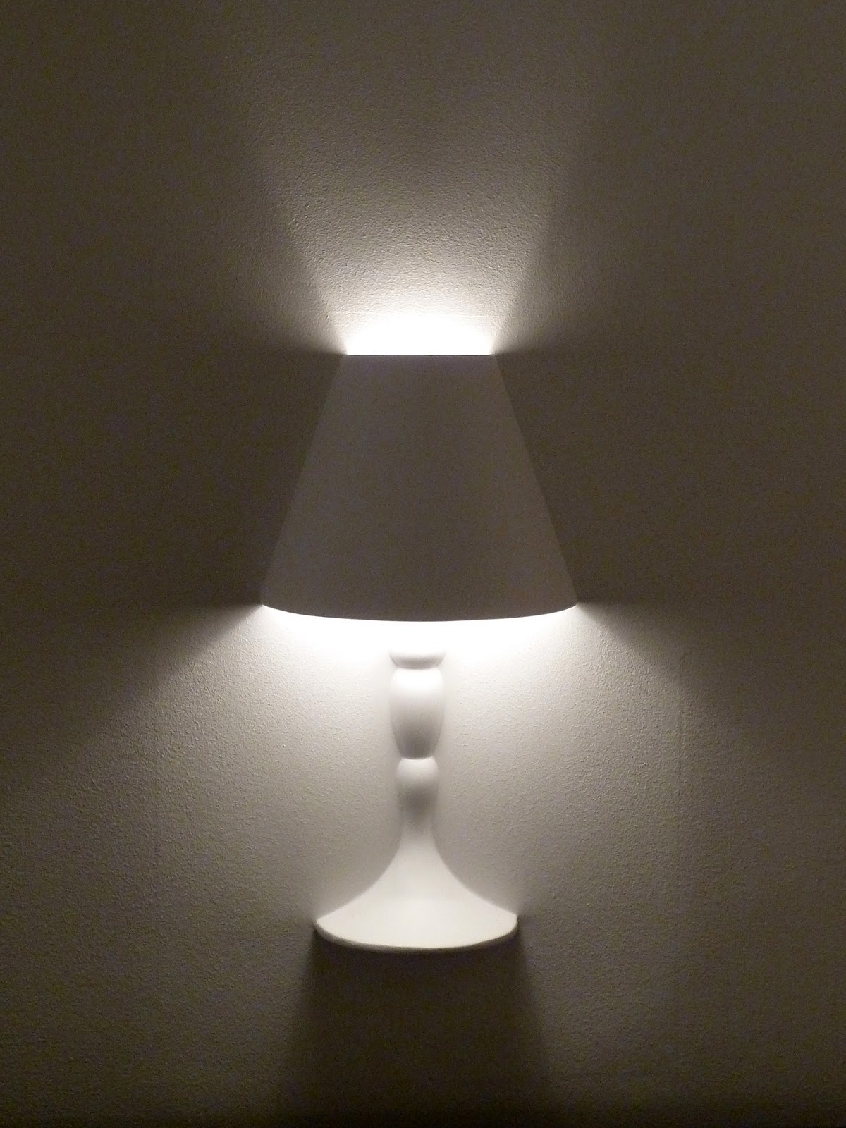 Verna trehus: kule lamper hos flos