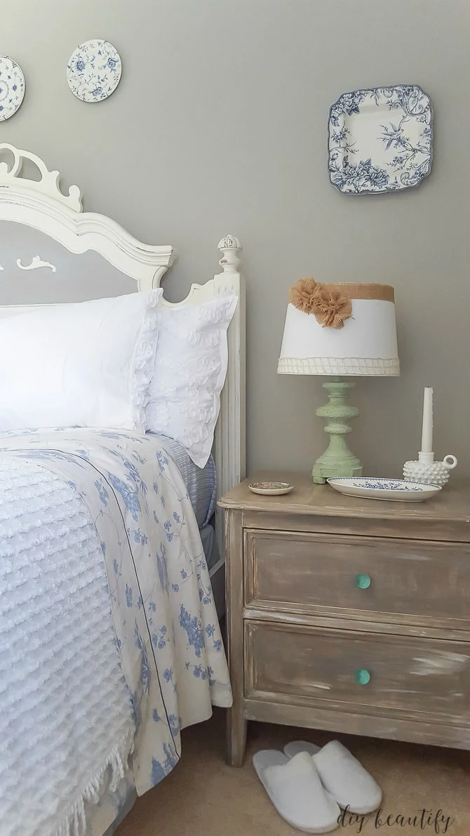 driftwood nightstand in blue and white room