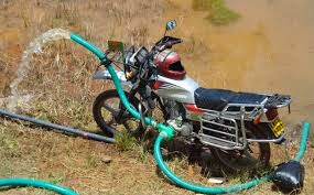 Kobo Ideas Creating Wealth With Resources Readily Available Motorcycle Used In Pumping Water From A River