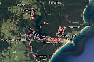 A satellite view of the Conjola Lake and surrounds. The fire damaged areas are indicated with red markings.