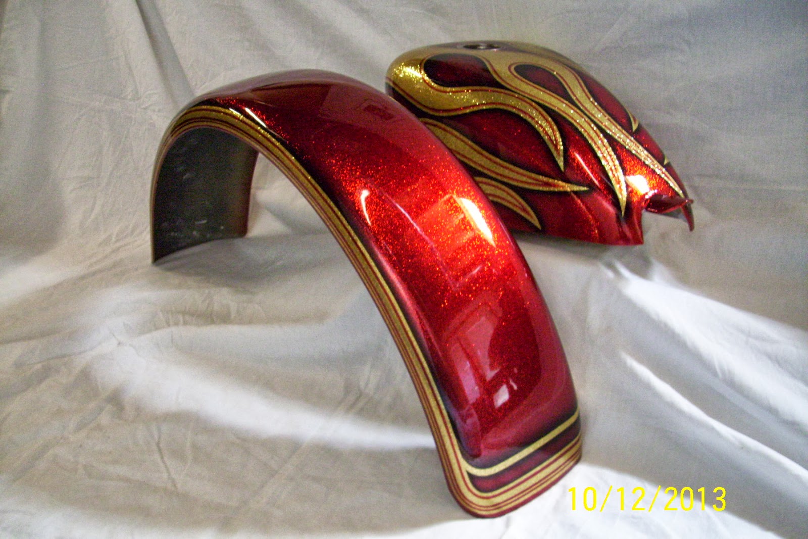 FlameThrowerCustoms Gold metalflake and Kandy Apple Red... it's an American institution