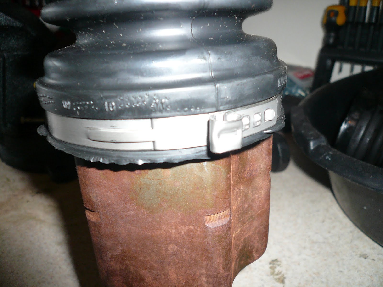 VW Passat Repair How to Replace The CV Joint Boot on a 2006 VW Passat 2.0 T.