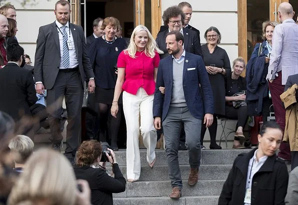 Crown Princess Mette-Marit wore a new belted wool-blend tweed peplum jacket by Oscar de la Renta. Prada shoes