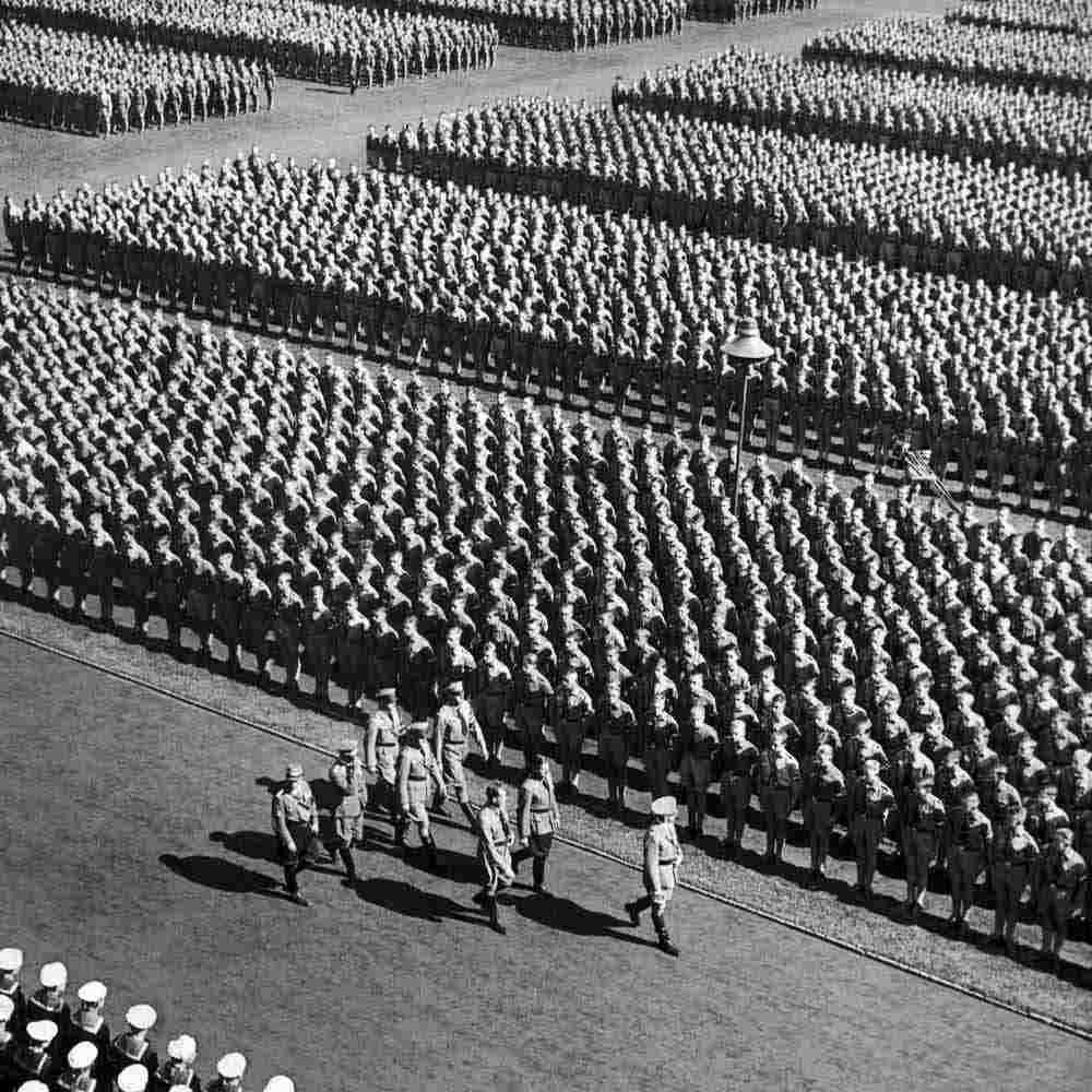 Фашистская германия парад. Съезд НСДАП В Нюрнберге 1937. Парад нацистов в Бюккебурге 1934. Парад третьего рейха. Стадион Нюрнберг третий Рейх.