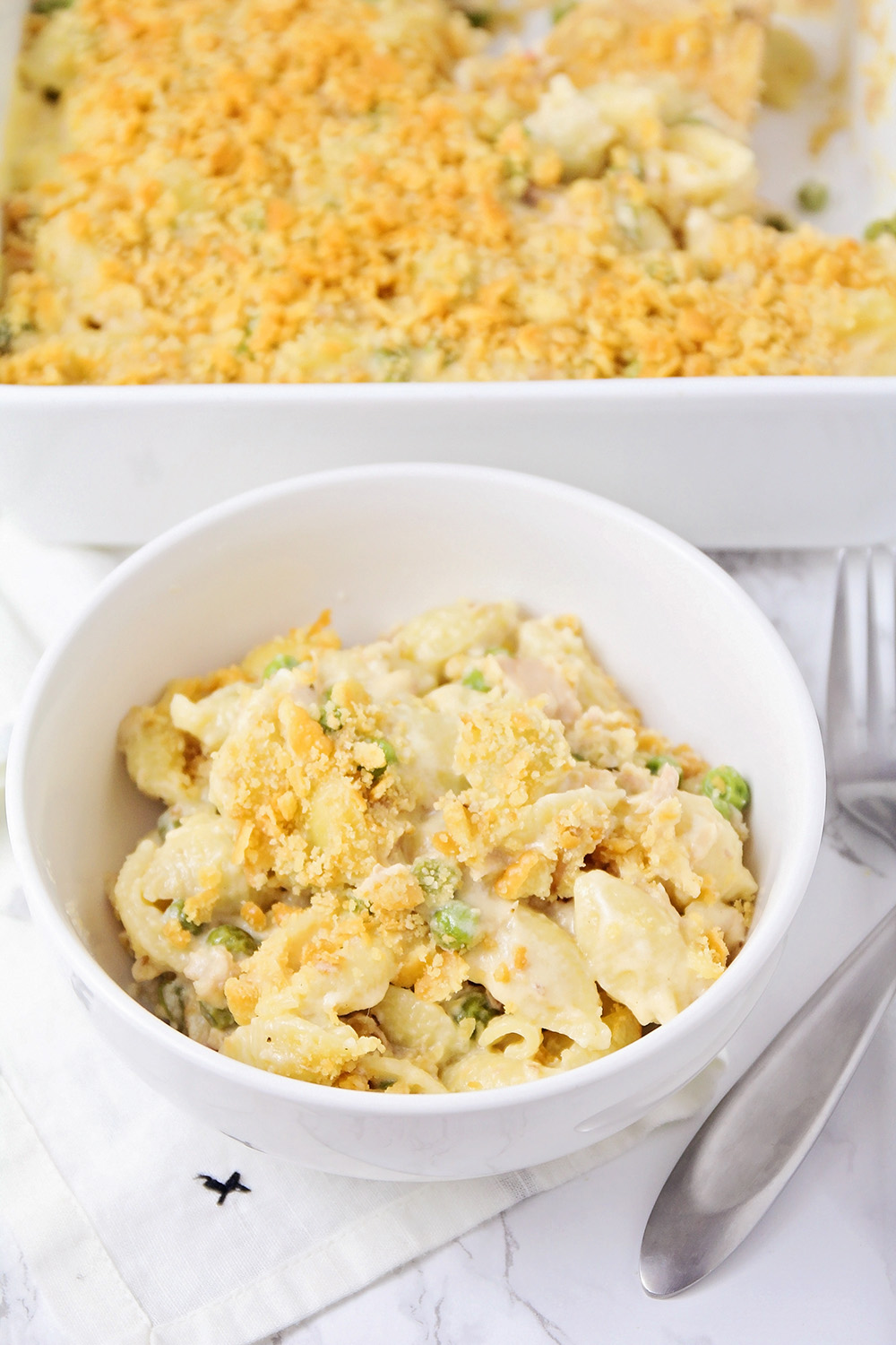 This creamy comfort food tuna casserole is made from scratch, and totally delicious!