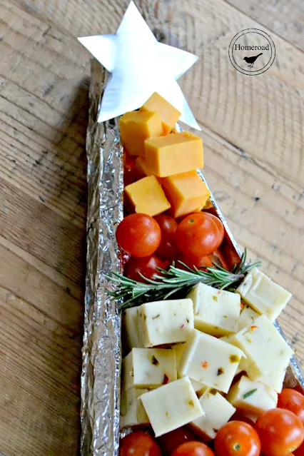 tree shaped charcuterie board with cheese and veggies