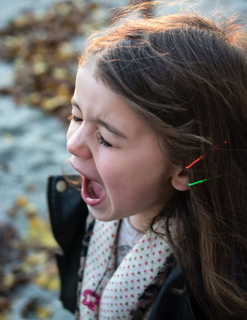 A shouting girl forcing us to use ways to handle stubborn and aggressive children.