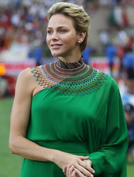 Princess Charlene wore Roland Mouret Henleigh one-shoulder crepe-jersey gown at Louis II Stadium, Dior earrings