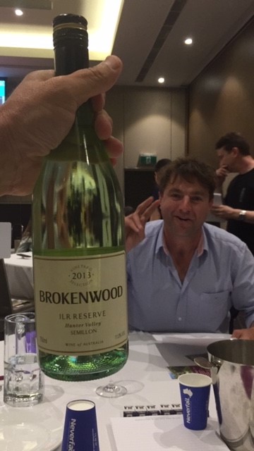 Stuart Horndern with Brokenwood bottle