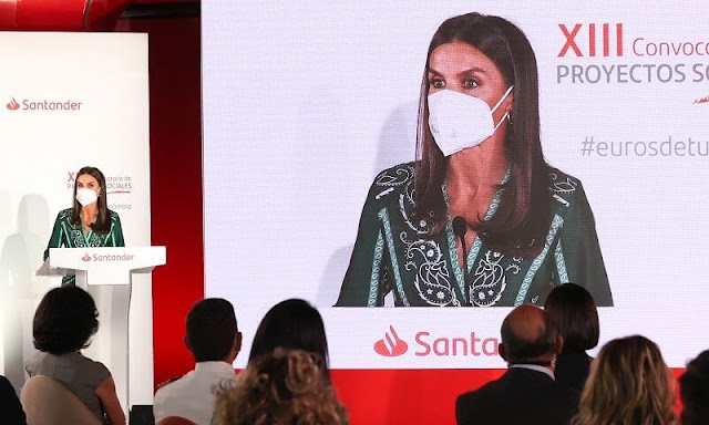 Queen Letizia wore a scarf print wrap long sleeve midi dress from Sandro. Minister Diana Morant and Director Ana Botin
