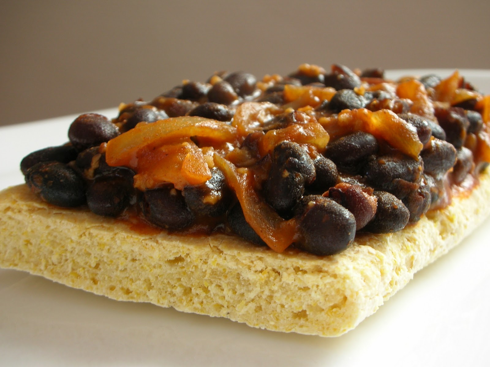 Three Cookies Blackbeans, polenta bread and banana spring rolls