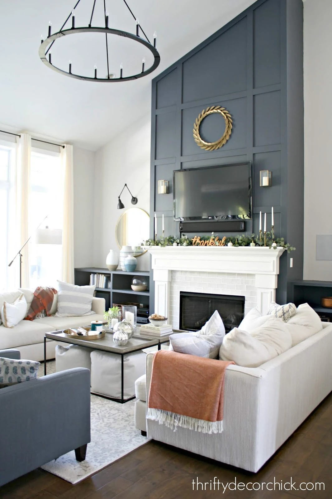 Dark blue tall fireplace wall with molding