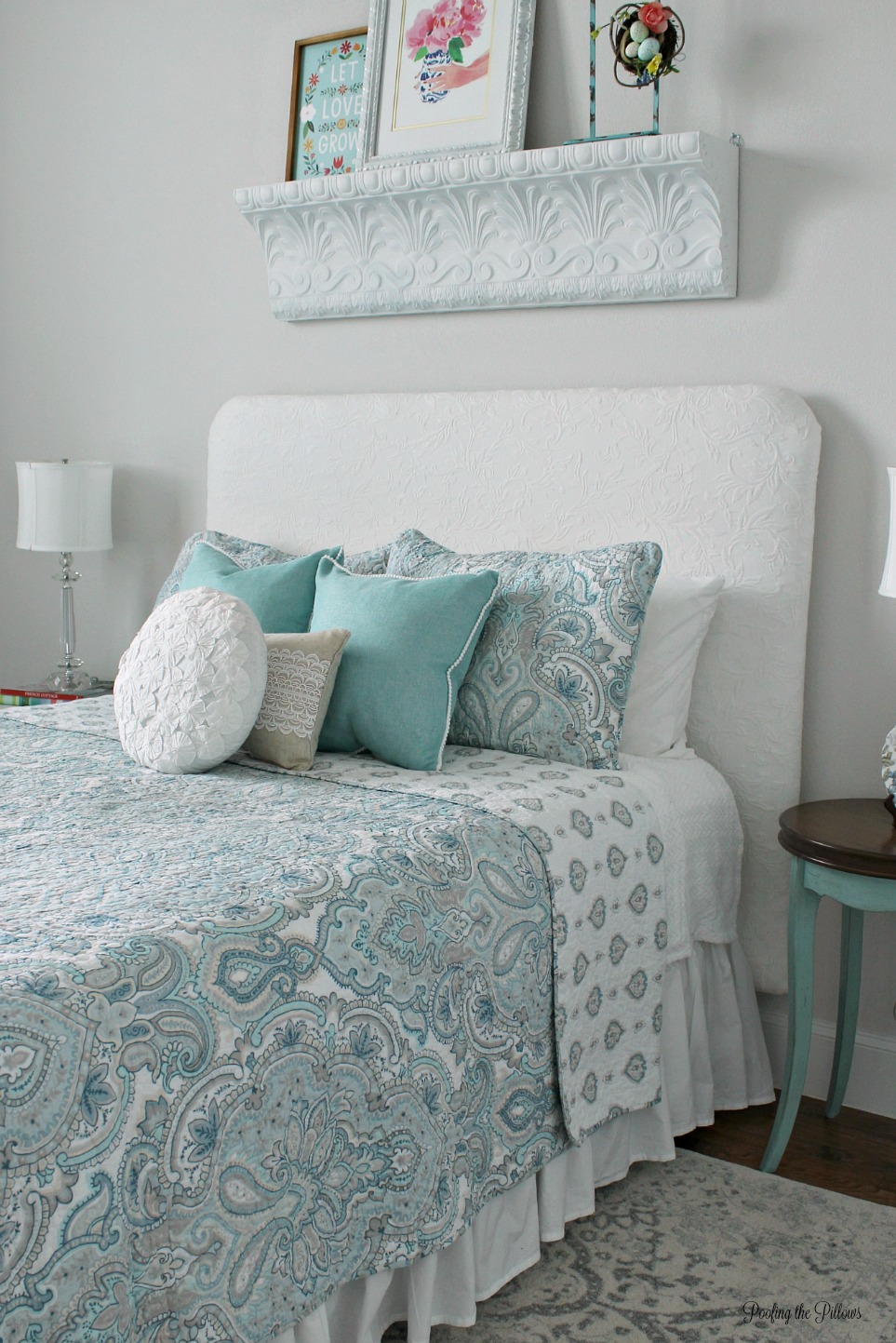A cottage style guest room, decorated in turquoise, gray, and lots of white. Old pieces have been painted and we shopped the house to make the room pretty and functional. Guests love it!