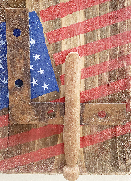 close up of rusty 4 and a clothespin