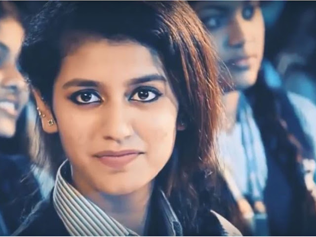 Priya Warrier Hd Images for WhatsApp Facebook status download,Priya Varrier Beautiful Smile hd images with video,Priya Warrier cute smiley images pictures wallpaper,Priya Prakash Warrier images full hd,Priya Prakash Warrier cute pictures wallpaper,Priya Prakash Facebook wallpaper Status images,Priya Prakash warrier photo download,Priya Prakash Warrier beautiful images And Bigography  pictures Profile images,Priya prakash age. Priya Praksh Warrier images,Priya Prakash Varrier New Latest HD Photos,Priya Prakash Varrier Biography 2018