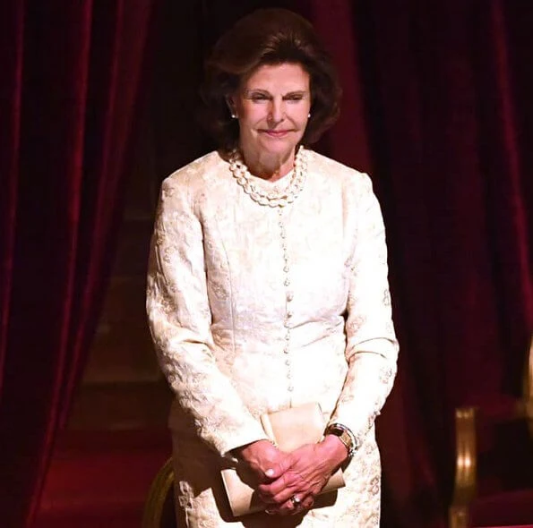 King Carl Gustaf and Queen Silvia watched a performance of the classic opera Rigoletto at the Royal Swedish Opera. pearls necklace