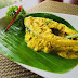 Hilsa wrapped in green leaves